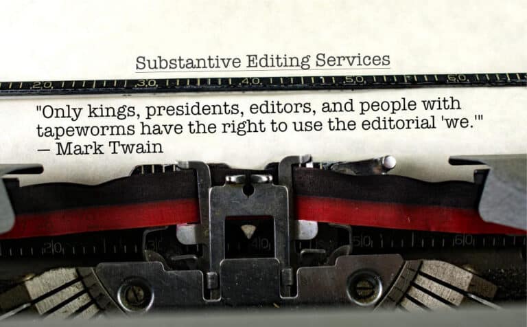 An old typewriter and sheet of paper with a Mark Twain quote about substantive editing services.